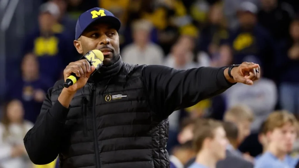 New Michigan head coach Sherrone Moore, renowned for his recruiting prowess..