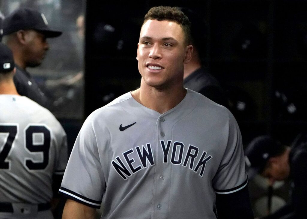 Aaron-Judge-New-York-Yankees-smiling-dugout-Texas-October-4-2022