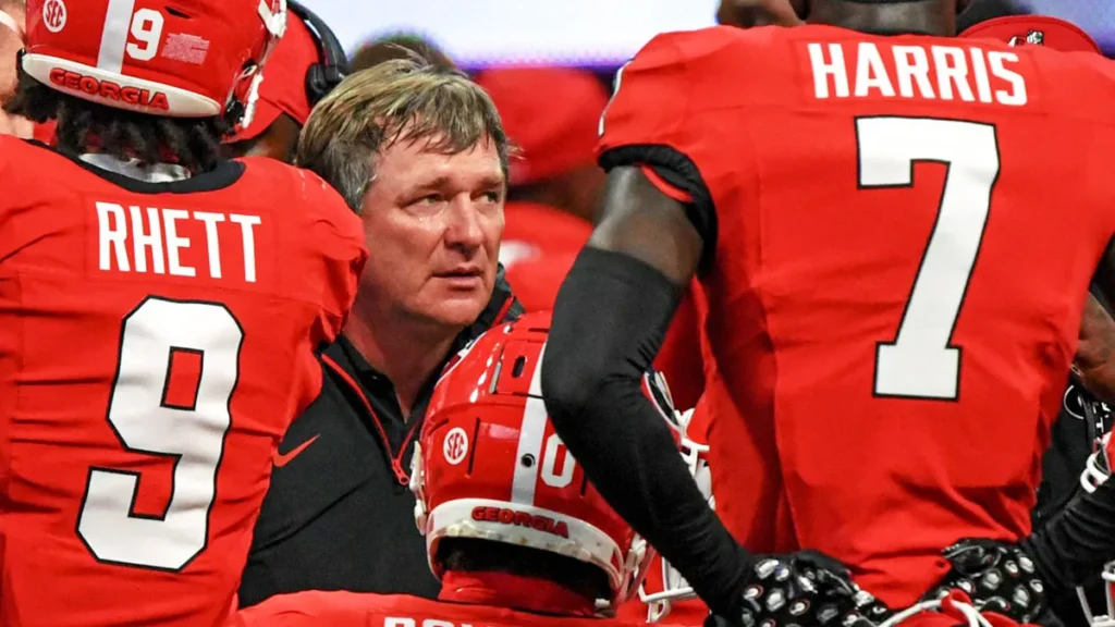 Georgia-football-head-coach-Kirby-Smart-in-a-huddle-with-his-players